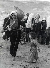 Palestinian refugees, 1948 Woman nakba dress jug.jpg