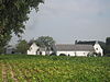 Ensemble van de gebouwen en de geplaveide binnenplaats van de boerderij van Mont te Perwez, alsook het ensemble van de boerderij, de dreef, de toegangsweg en de omliggende terreinen