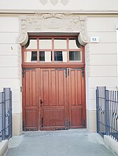 Adorned wooden door