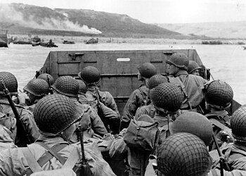 American troops in an LCVP landing craft appro...