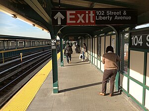 Brooklyn bound platform at 104 St on the Fulton St Line.jpg
