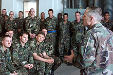 Clark briefs U.S. airmen from the 510th and 555th Fighter Squadrons at Aviano Air Base, Italy in May 1999. Clark briefs NATO May 9.JPEG