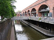 "Deansgate Locks" bars under Deansgate Metrolink station in Manchester. Deansgate Locks - geograph.org.uk - 1352312.jpg
