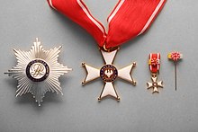 insygniów Krzyża Komandorskiego z Gwiazdą OOP