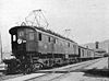 An EP-3 locomotive pulls a passenger train circa 1922