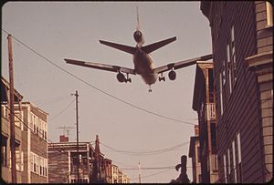 NEAR LOGAN AIRPORT-AIRPLANE COMING IN FOR A LA...