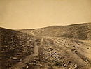 הצילום המפורסם ביותר של פנטון גיא צלמוות - כדורי ארטילריה מכסים נוף.