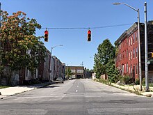 View west along Lombard Street (MD 144) at Monroe Street (US 1) in Baltimore 2020-07-29 12 49 37 View west along Maryland State Route 144 (West Lombard Street) at U.S. Route 1 southbound (South Monroe Street) in Baltimore, Maryland.jpg
