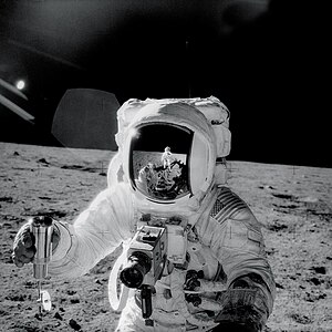 Apollo 12 astronaut Alan Bean holds a special ...