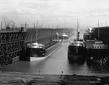Duluth, Missabe and Iron Range Railway ore docks loading ships, circa 1900-1915. Duluth Ore Docks.jpg