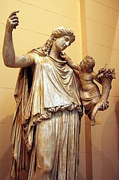 Statue of Eirene, goddess of peace in ancient Greek religion, with the infant Plutus Eirene et Ploutos.JPG