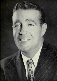 Head shot of Frank Leahy in a suit.