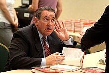 Mike Huckabee at a book signing Mike Huckabee RLC Book signing 2011.jpg
