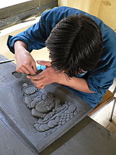 Slate carving, School of Traditional Arts. Slate carving, School of Traditional Arts, Thimphu.jpg