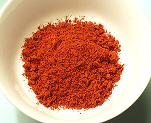 A small bowl of hot smoked Spanish paprika (pi...
