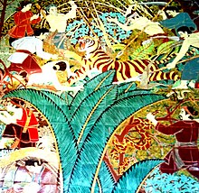 Porcelain painting in Ben Duoc Temple describing Vietnamese settlers fighting wild animals, especially tigers Tranh gom Ben Duoc (cropped).jpg