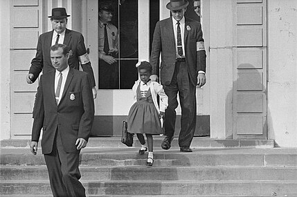 U.S. Marshals protect 6-year-old Ruby Bridges, the only black child in a Louisiana school (1960)