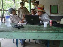 The poet and linguist Víctor Manuel Ramos validating the Diccionario de las Lenguas de Honduras with members of the Tolupan ethnic group.