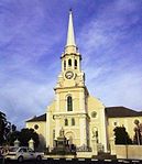 The cornerstone of the original church building was laid on 27 June 1838 and the building was completed in 1840. In 1861 it was converted into a crucifix church by the addition of two wings. The prominent tower was designed by C. Freeman and H.J. Jones. Type of site: Church Complex