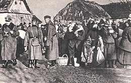 Expulsion of Poles from villages in the Zamosc Region by the SS in December 1942 Wysiedlanie-Zamojszczyzna.jpg