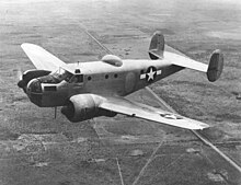 Beechcraft AT-11 over the West Texas prairies, around 1944 Beechcraft AT-11 out over the West Texas prairies (00910460 103).jpg
