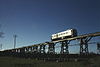 Railmotor number 1901 crosses the Splitters Creek railway bridge circa 1989