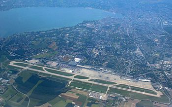 Geneva International Airport, with the city of...