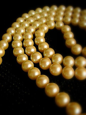 A golden pearl necklace.