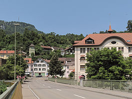 View to a street from bridge across river Birs