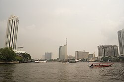 Khlong Ton Sai (left) as seen from the midstream of the Chao Phraya