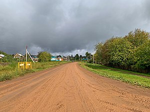 Улица Кезская в селе после дождя