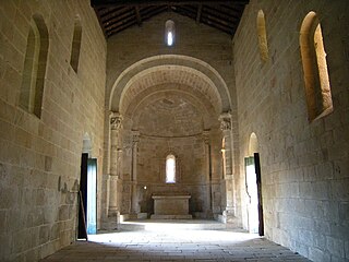 Main altar and nave of the church of Sanfins de Friestas, the narrow lateral and front windows are another Romanesque trademark.