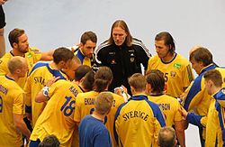Staffan Olsson (mitten) som förbundskapten för Sveriges landslag, 2011.