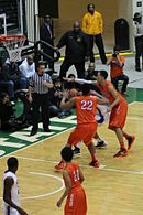 20130126_White-Okafor_doubleteam_leads_to_Okafor_block_of_Parker_at_Simeon-Whitney_Young_game_%281%29.JPG