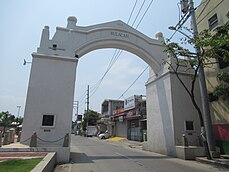 White stone arch on the road