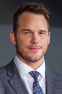 Chris Pratt  - 2024 Light brown hair & crew cut hair style.
