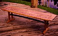 Bench made of highly-figured maple.