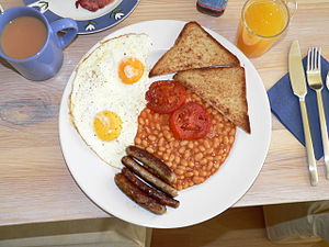 A full English breakfast, consisting of eggs, ...