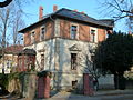 Villa mit Einfriedung