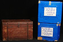 Immigrant trunks from Sweden in the late 19th century (on left) and from a refugee camp in Thailand in 1993 (on right) Immigrant trunks.jpg