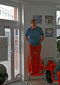 Unconventional lecture solutions became necessary in Cologne as one of our volunteers delivered an introductory speech standing on a chair.