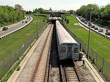 Southbound train in the median of Allen Road towards Eglinton West station in 2010. Subway tracks in Toronto were built to
4 ft 10+7/8 in (1,495 mm), the same gauge used by the TTC's streetcar system. On track to Eglinton West TTC.jpg