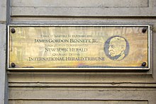 A plaque in Paris commemorates the history of the Paris edition of the New York Herald and notes that it became the International Herald Tribune Plaque James Gordon Bennett Jr., 49 avenue de l'Opera, Paris 2.jpg