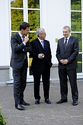 Dutch Prime Minister Mark Rutte, Luxembourg Prime Minister Jean-Claude Juncker, and Belgian Prime Minister Yves Leterme in The Hague, Netherlands, on 24 May 2011 Terras van het Catshuis.jpg