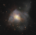 Arp 220 in una combinazione di immagini dell'Hubble e del JWST