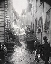 Bandit's Roost, located in the notorious Mulberry Bend fifty-seven years after merchants proposed their 1831 "Petition to Have the Five Points Opened". Picture by Jacob Riis, 1888. Bandits Roost, 59 and a half Mulberry Street.jpg