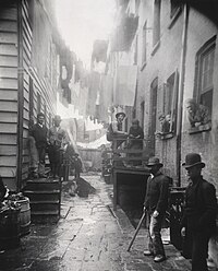 "Bandit's Roost", a Mulberry Street back alley, photographed by Jacob Riis in 1888, a target of police efforts in the 1880s and 1890s Bandits Roost, 59 and a half Mulberry Street.jpg
