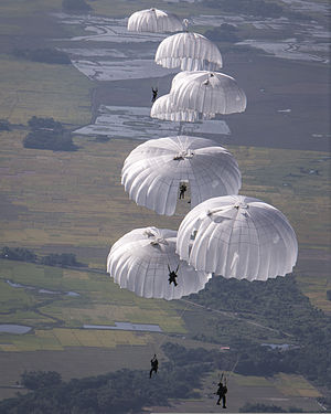 Paratroopers deploying their parachutes during an exercise Bangladesh Air Force (BAF) paratroopers jump from a U.S. Air Force C-130 Hercules aircraft over Bangladesh during exercise Cope South 14 Nov. 10, 2013 131110-F-SI013-240.jpg