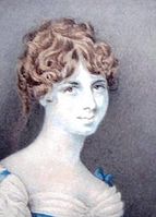 Retrato de Clara María Pope, desde el busto. Peinado recogido y cabello de color miel oscura.