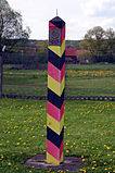 One of the distinctive East German "barber pole" border markers. The spike on the top deterred birds from using it as a perch.